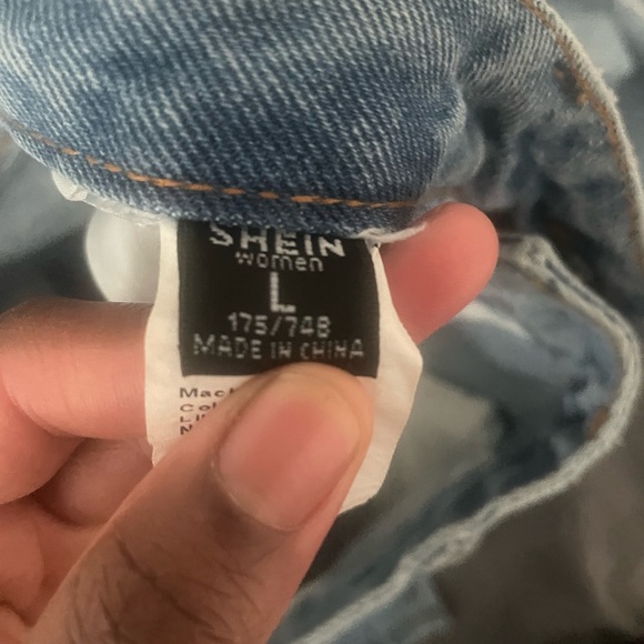 jeans from SHEIN with smileys on the from. Pretty good quality and unused - Picture 2 of 3
